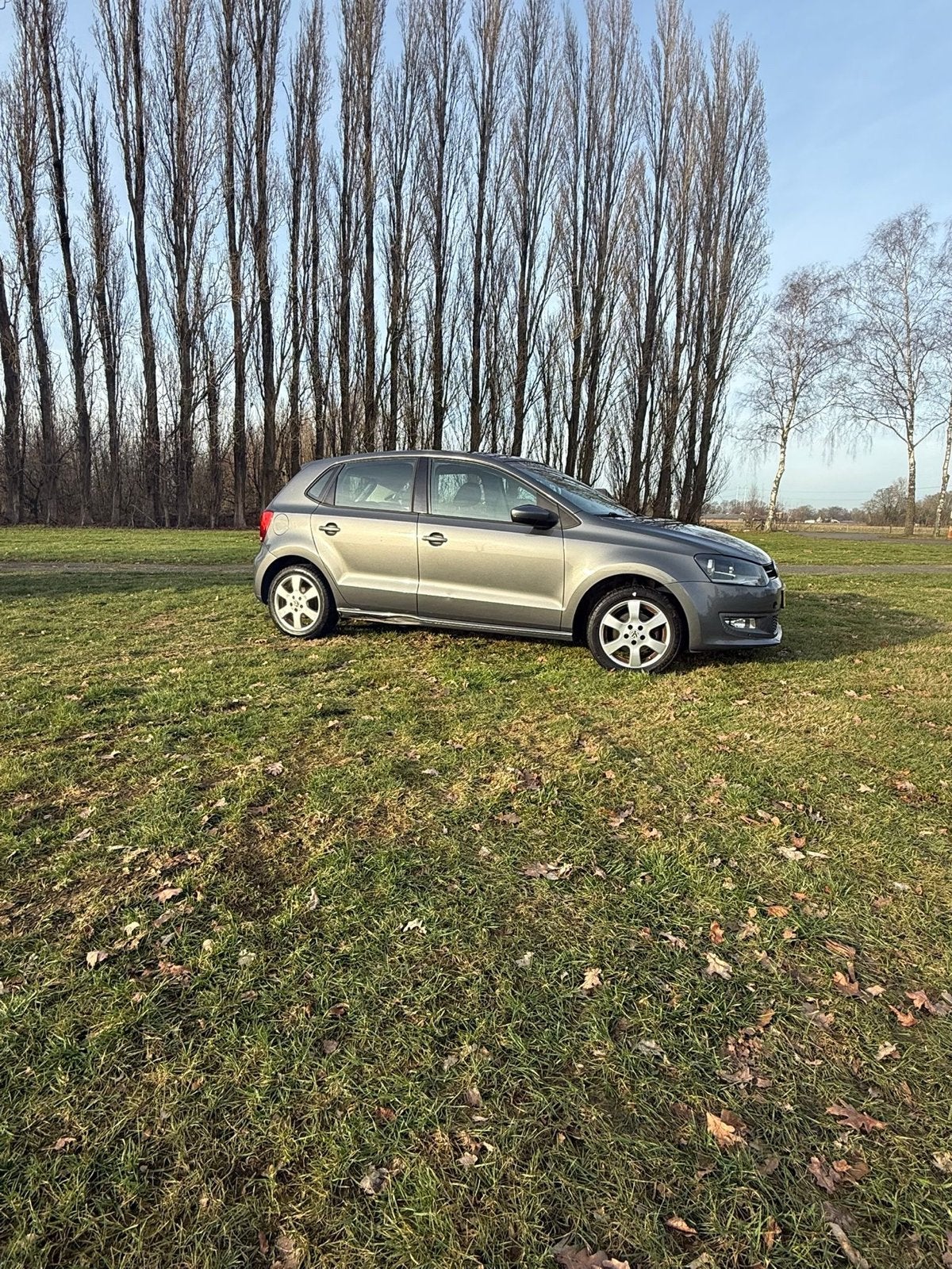 Volkswagen Polo 1.2 TSI 66KW 2012 Grijs, Auto's, Voorwielaandrijving, 40 €/maand, 4 cilinders, Origineel Nederlands
