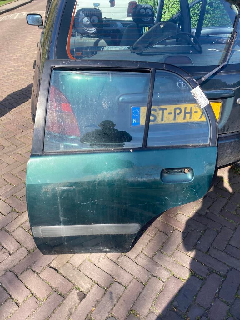 Toyota starlet 5 deurs portier links achter, Auto-onderdelen, Carrosserie en Plaatwerk, Ophalen of Verzenden, Achter, Toyota, Deur