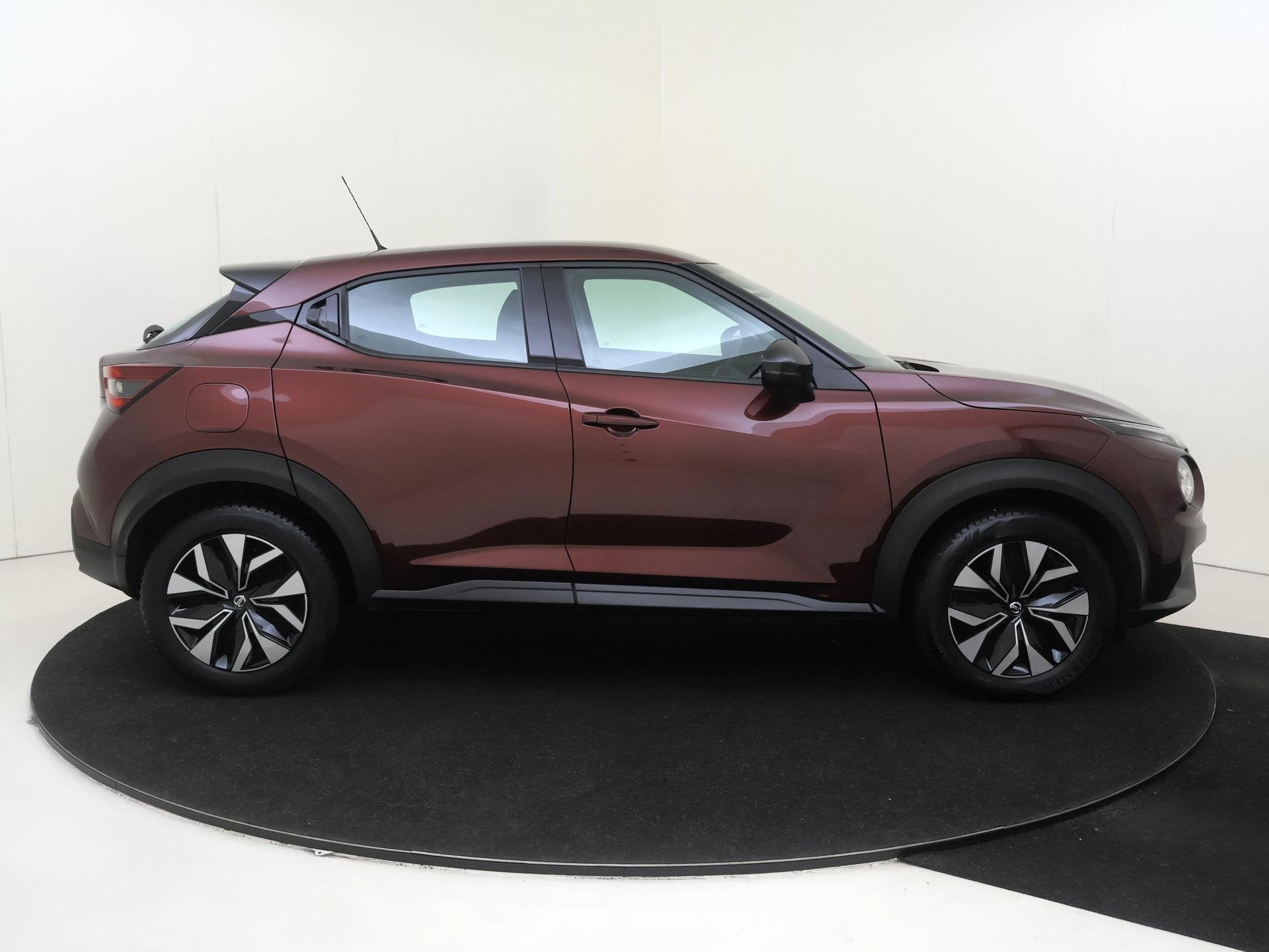 Foto 9 van Nissan Juke 1.0 DIG-T Acenta | Achteruitrijcamera | Wieldopp