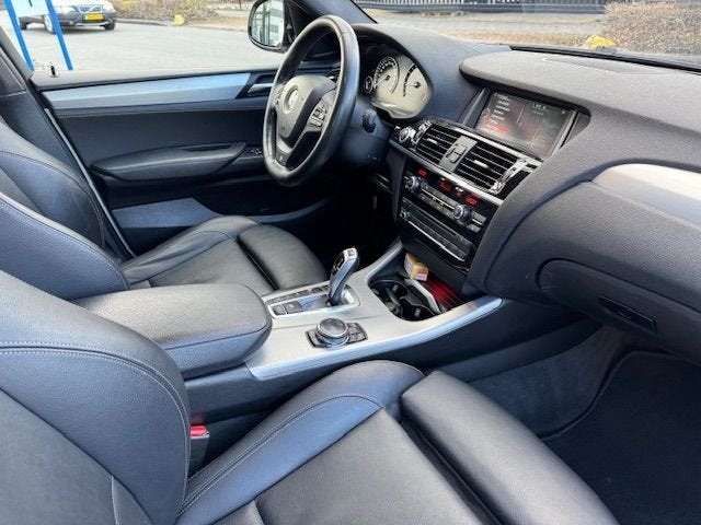 BMW X4 xDrive20i High Executive M-Edition Automaat Airco/ECC, Gebruikt, 4 cilinders, Wit, Bedrijf