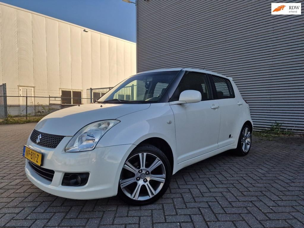 Suzuki Swift 1.3 Base NAVI PARELMOER 5 DEUR BOEKJES, Auto's, Suzuki, Voorwielaandrijving, 400 kg, Bedrijf, Handgeschakeld