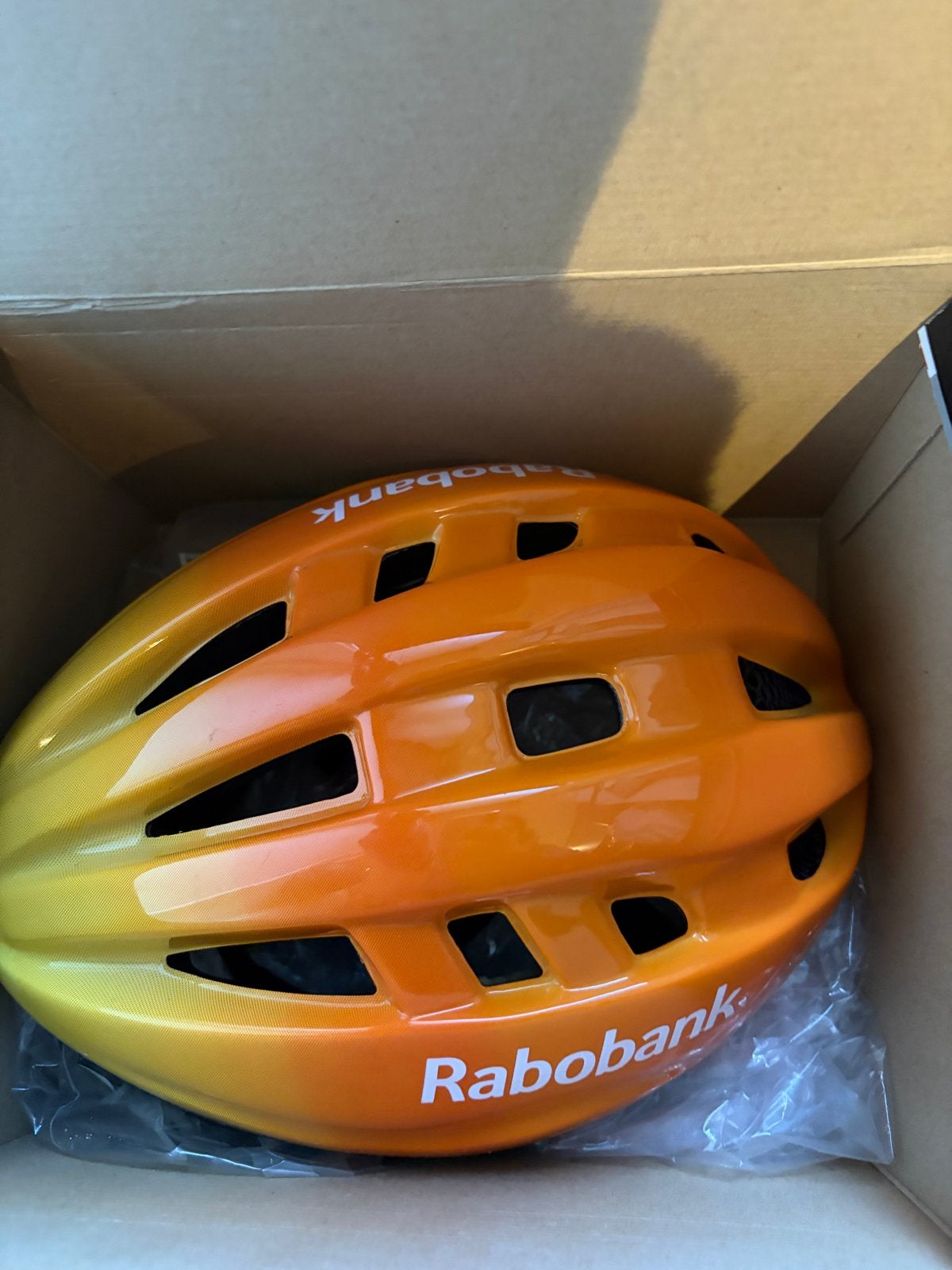 Nieuwe Rabobank kinderfietshelm, Ophalen, Nieuw, M, Jongen of Meisje
