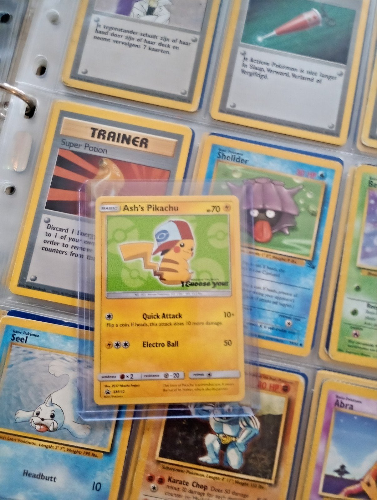 Ash's Pikachu Pokémon Kaart - SM112 Black Star Promo, Ophalen of Verzenden