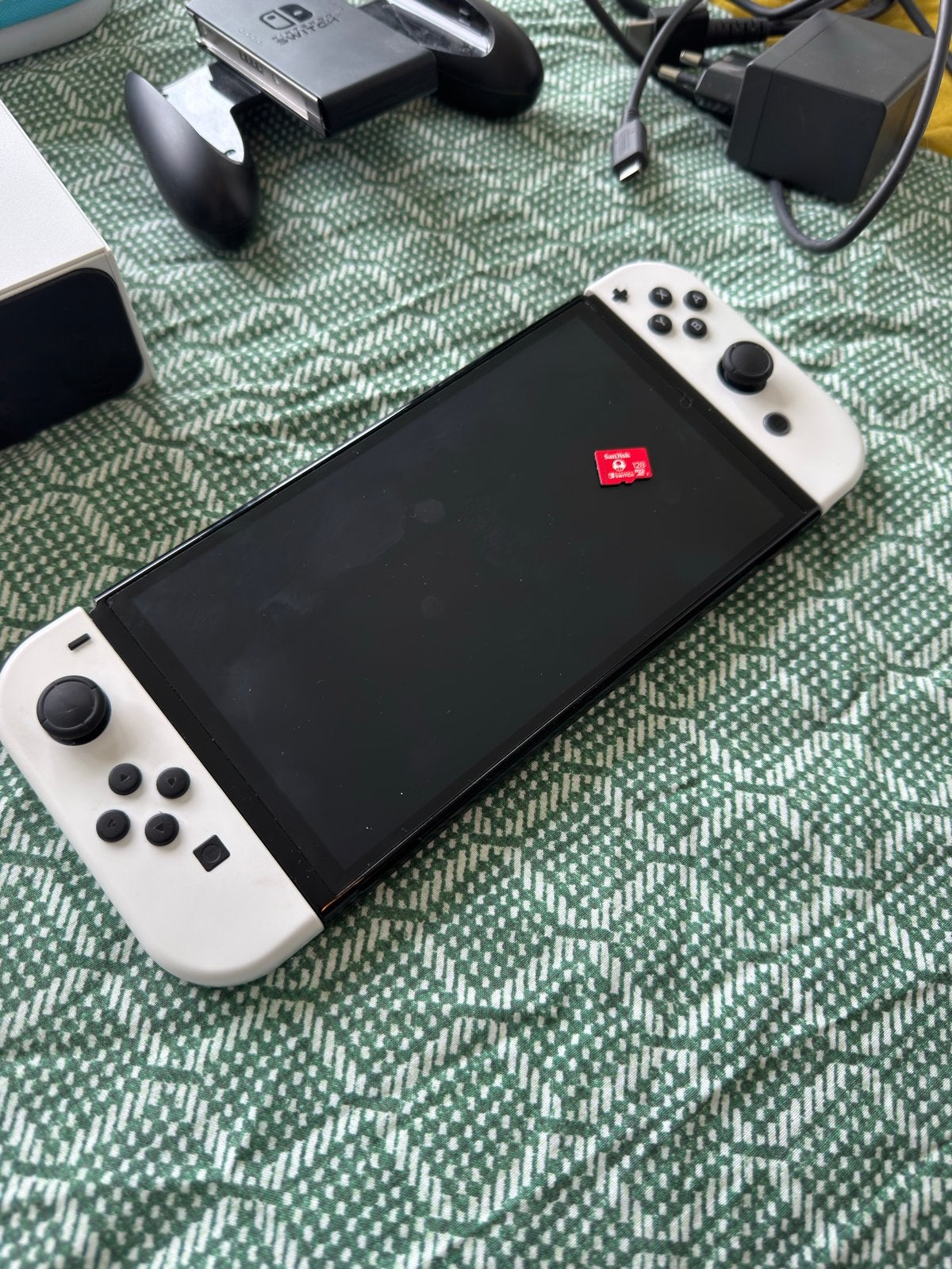 Nintendo Switch OLED met Ring Fit Adventure en accessoires