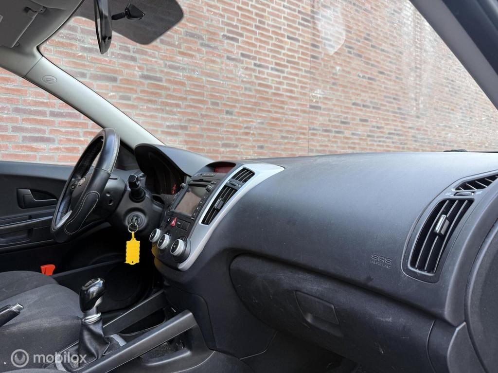 Kia cee'd Sporty Wagon 1.4 CVVT X-ecutive|Nap|Navi|Trekhaak, Auto's, Kia, Voorwielaandrijving, Euro 5, Gebruikt, 4 cilinders