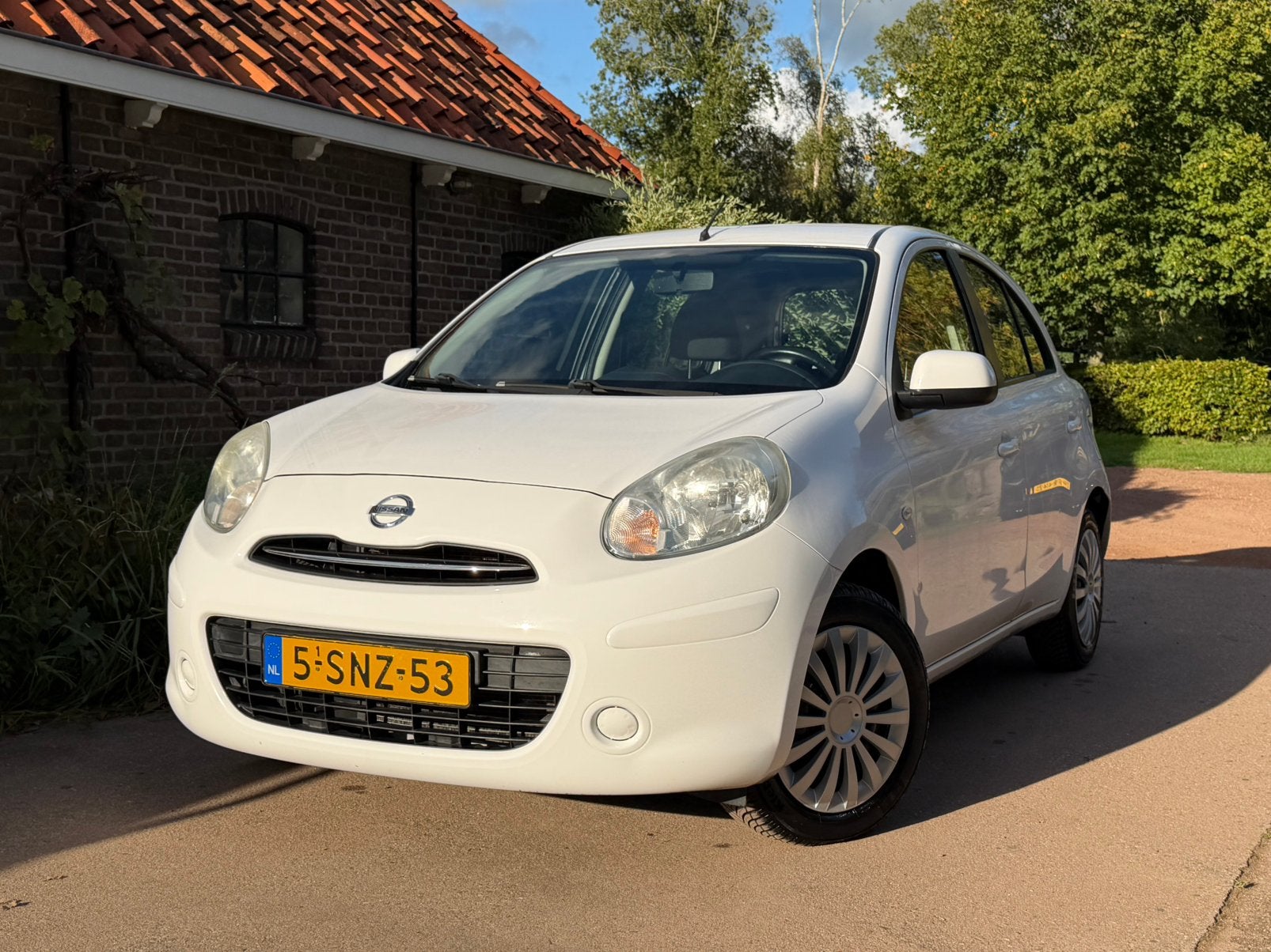 Nissan Micra 1.2 DIG-S 98 PK | 5-deurs | NAP | Airco |, Voorwielaandrijving, Stof, 40 €/maand, Zwart