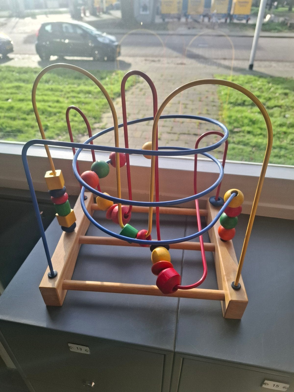 houten kralenspiraal speelgoed, Ophalen