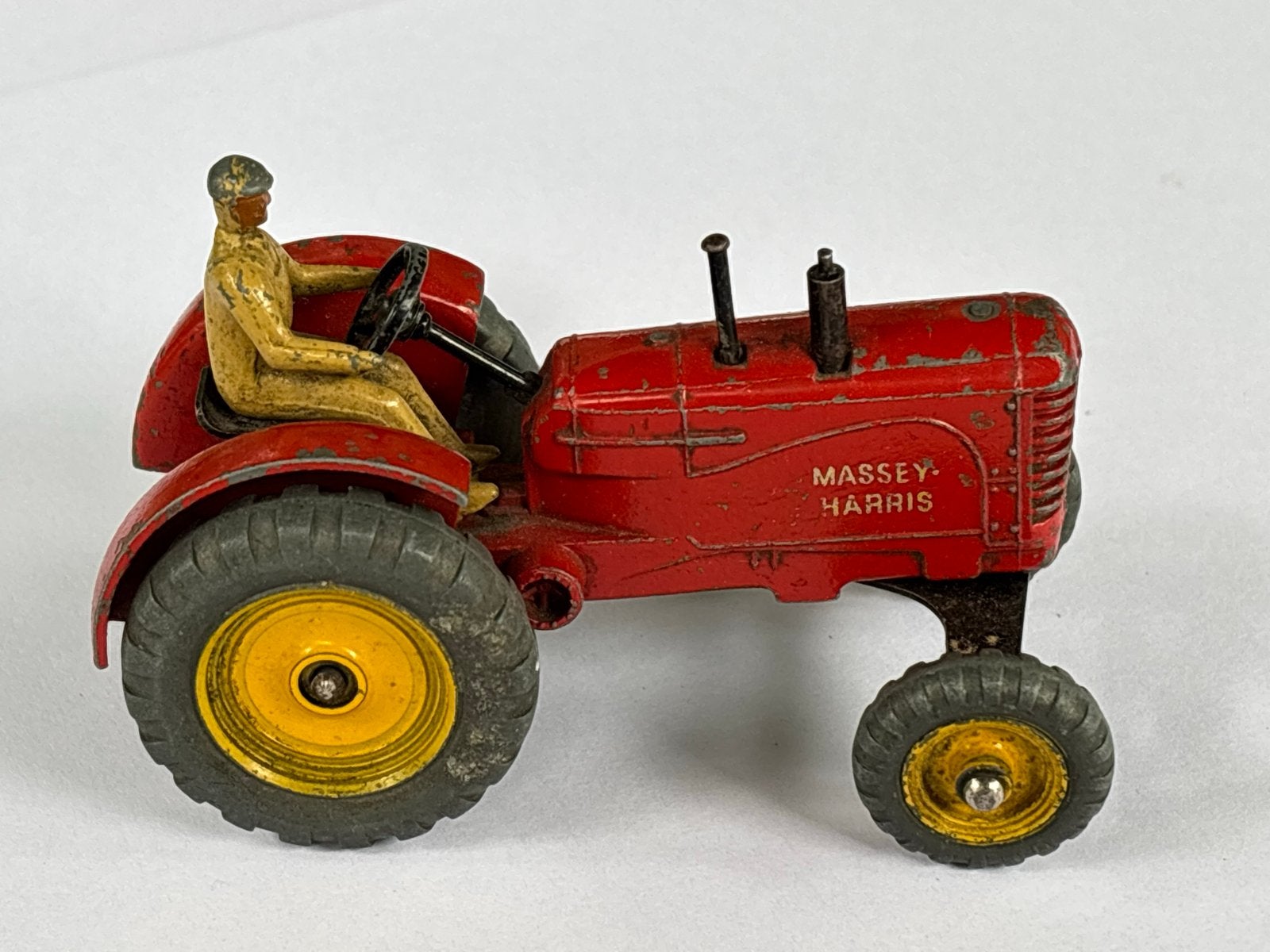 Dinky Toys 300 Massey Harris Tractor +bestuurder 1950s FRAAI, Hobby en Vrije tijd, Modelauto's | 1:43, Ophalen of Verzenden, Gebruikt
