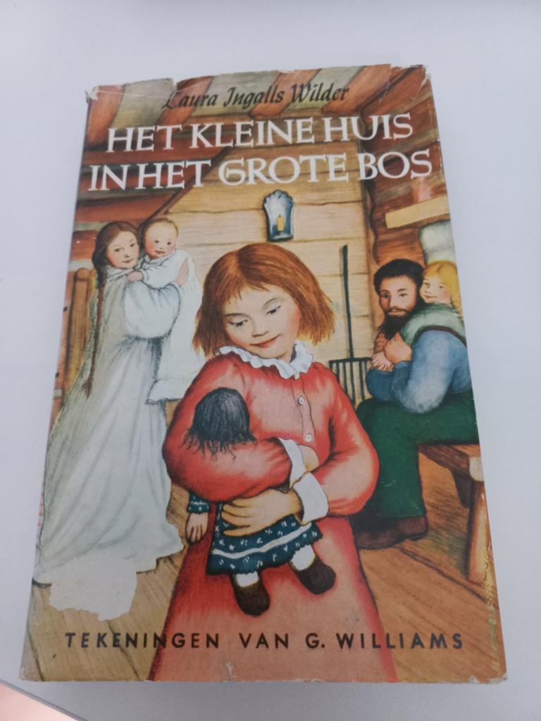 Het kleine huis in het grote bos – Laura Ingalls Wilder, Boeken, Ophalen of Verzenden, Gelezen