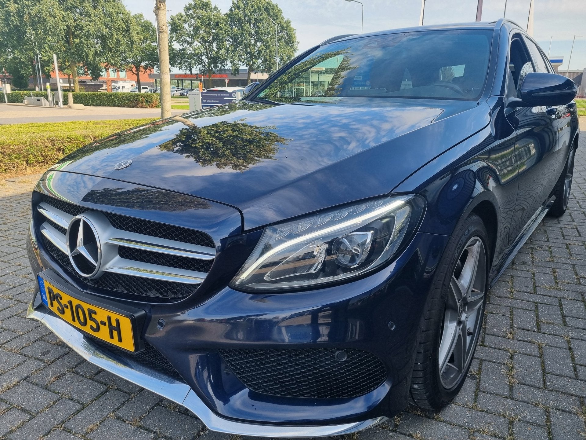 Mercedes-Benz C-klasse Estate 180 Business Solution AMG Pano, Auto's, Automaat, Dealer onderhouden, Achterwielaandrijving, Blauw