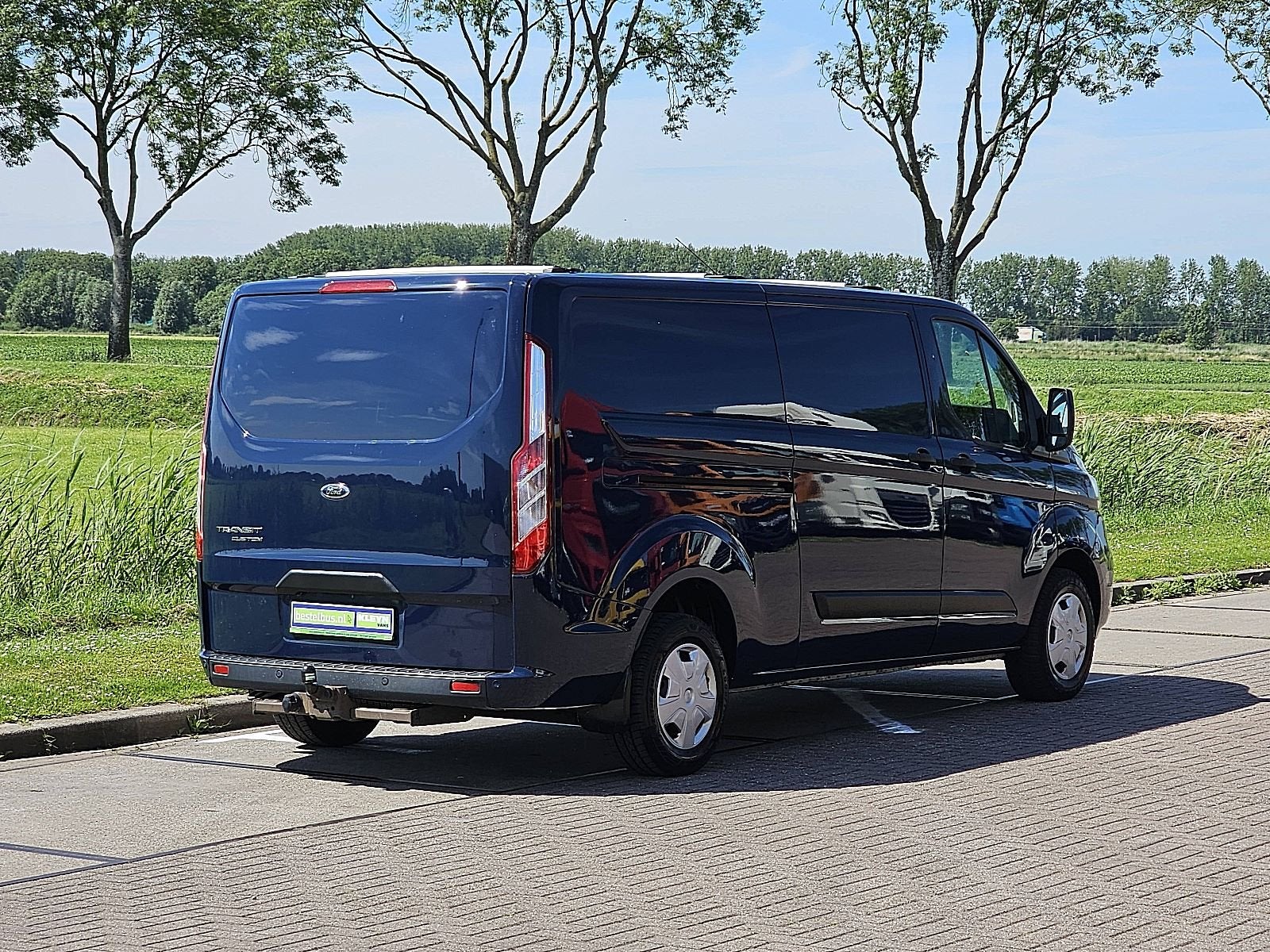 FORD TRANSIT CUSTOM l2h1 navi trekhaak!, Auto's, Gebruikt, Euro 6, Navigatiesysteem, Blauw