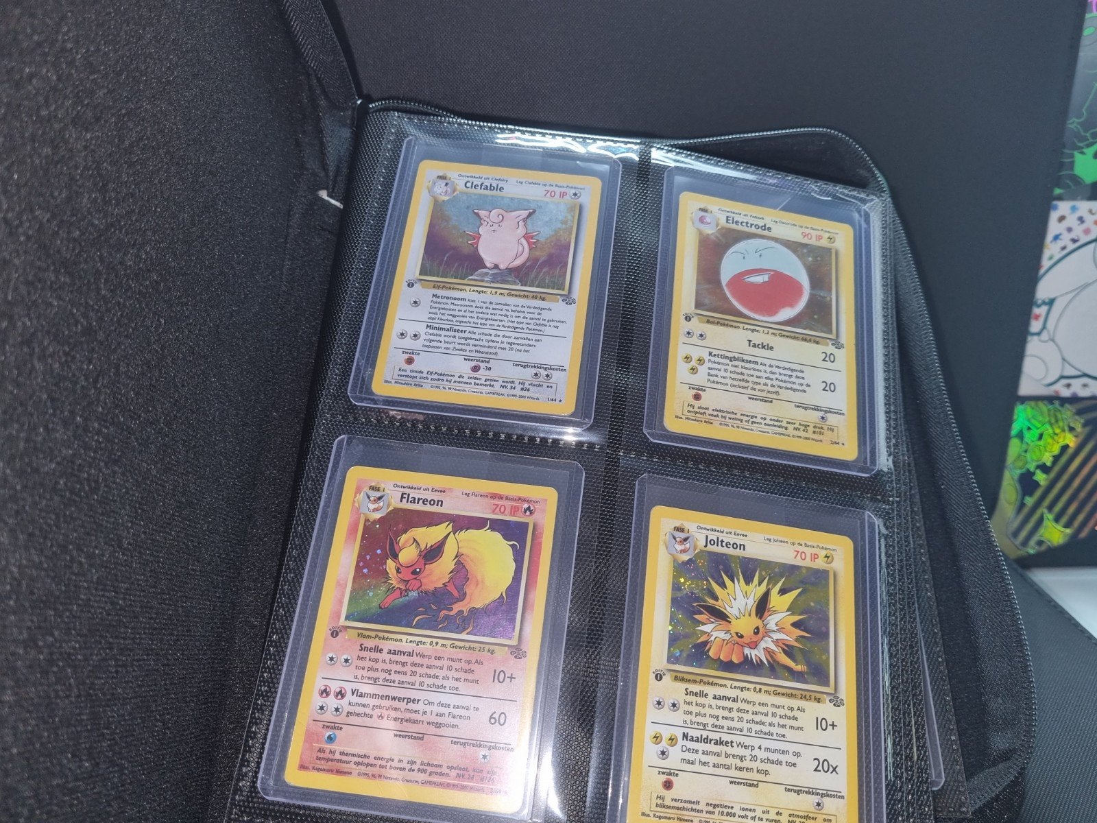 Complete pokemon jungle 1st ed. NL set, Ophalen of Verzenden, Zo goed als nieuw, Meerdere kaarten