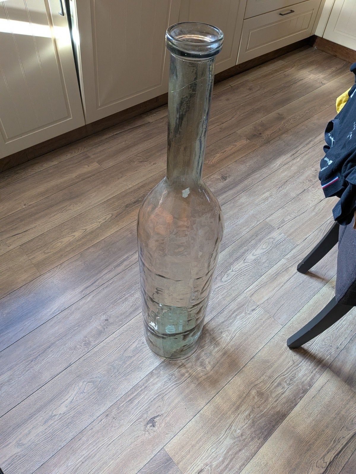 Grote decoratieve glazen fles, Ophalen