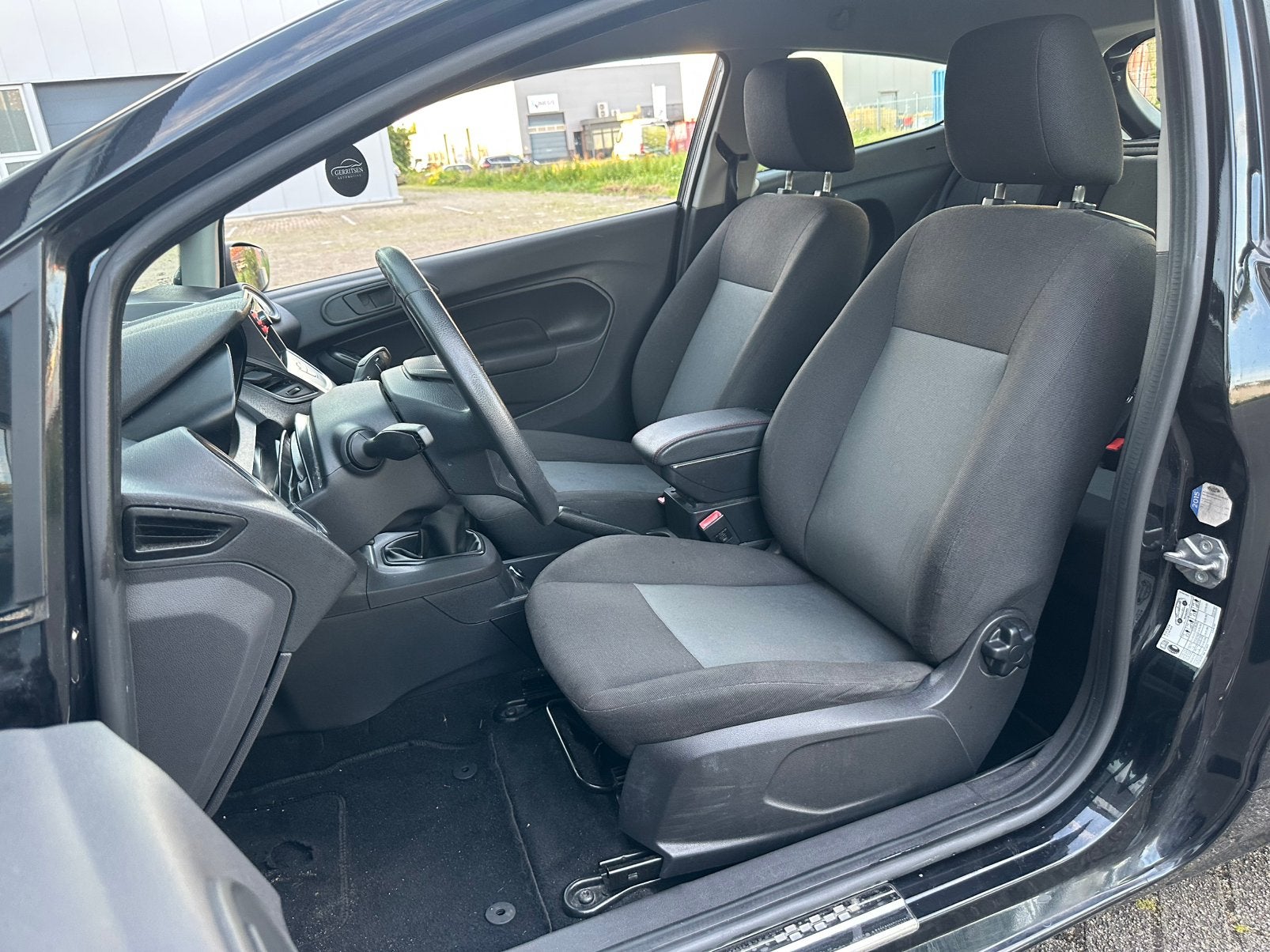 Foto 20 van Ford Fiësta 1.25 44KW 3DR 2014 Zwart/17INCH/CRPLY/NW ONDRHD