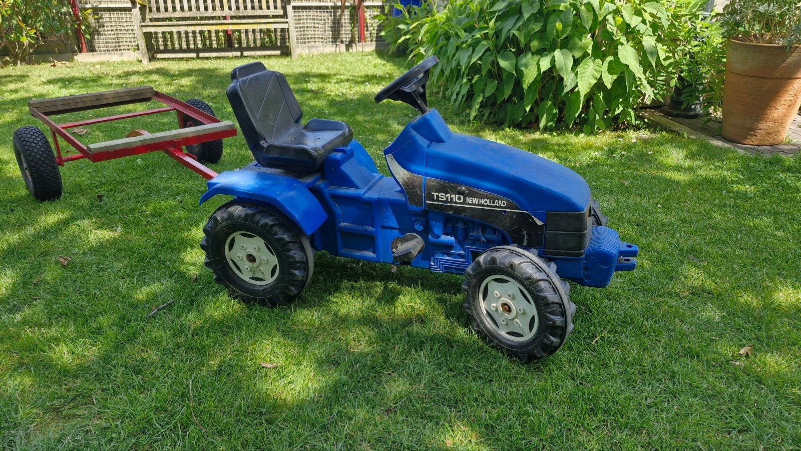 Blauwe New Holland TS110 Traptractor met Kar, Ophalen, Gebruikt, Trapvoertuig