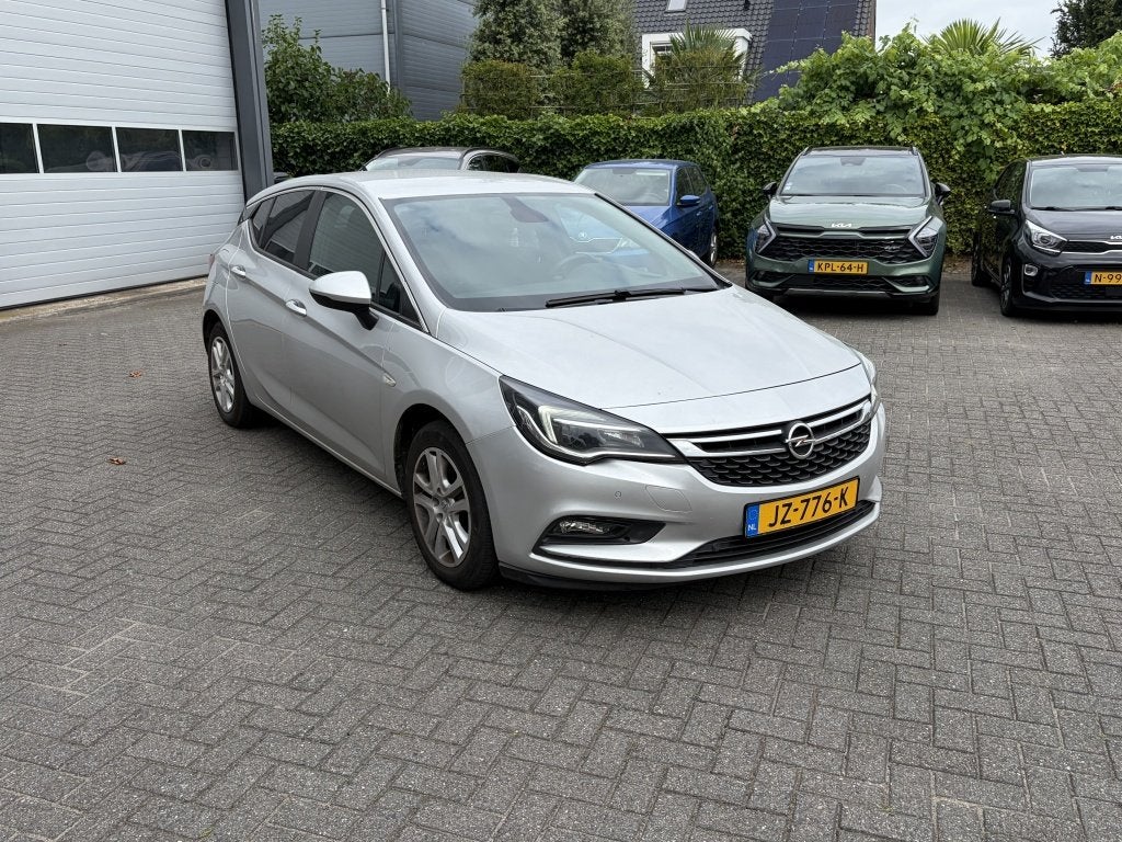 Opel Astra 1.4 Business+ automaat en trekhaak (bj 2016), Auto's, Opel, Automaat, Gebruikt, 4 cilinders, 150 pk