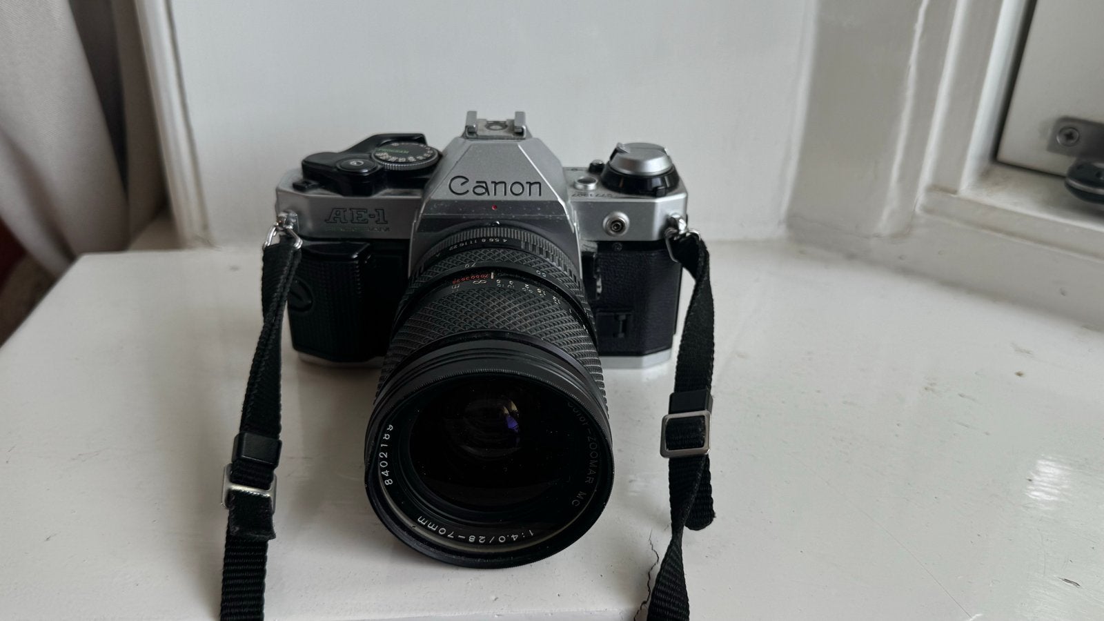 Canon AE-1 Program Spiegelreflexcamera met 28-70mm lens, Audio, Tv en Foto, Fotocamera's Analoog, Ophalen of Verzenden, Gebruikt