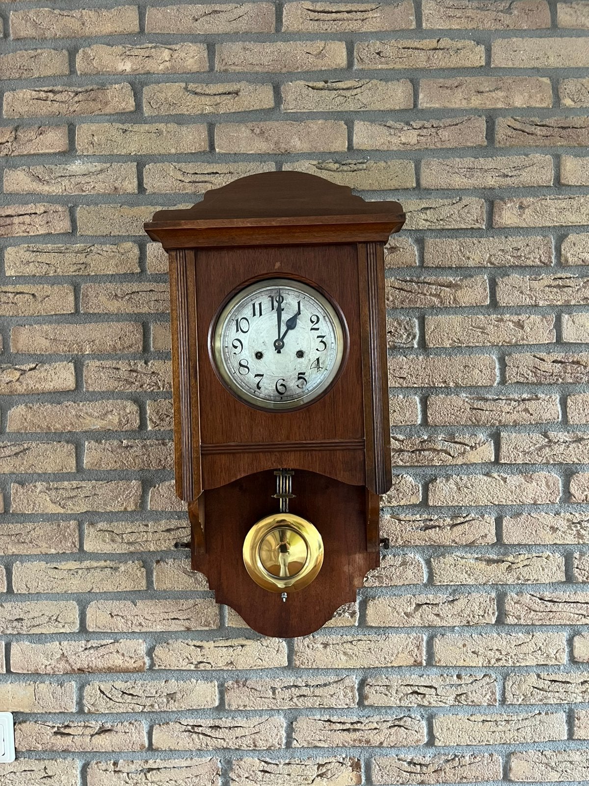 Antieke hangklok, Ophalen