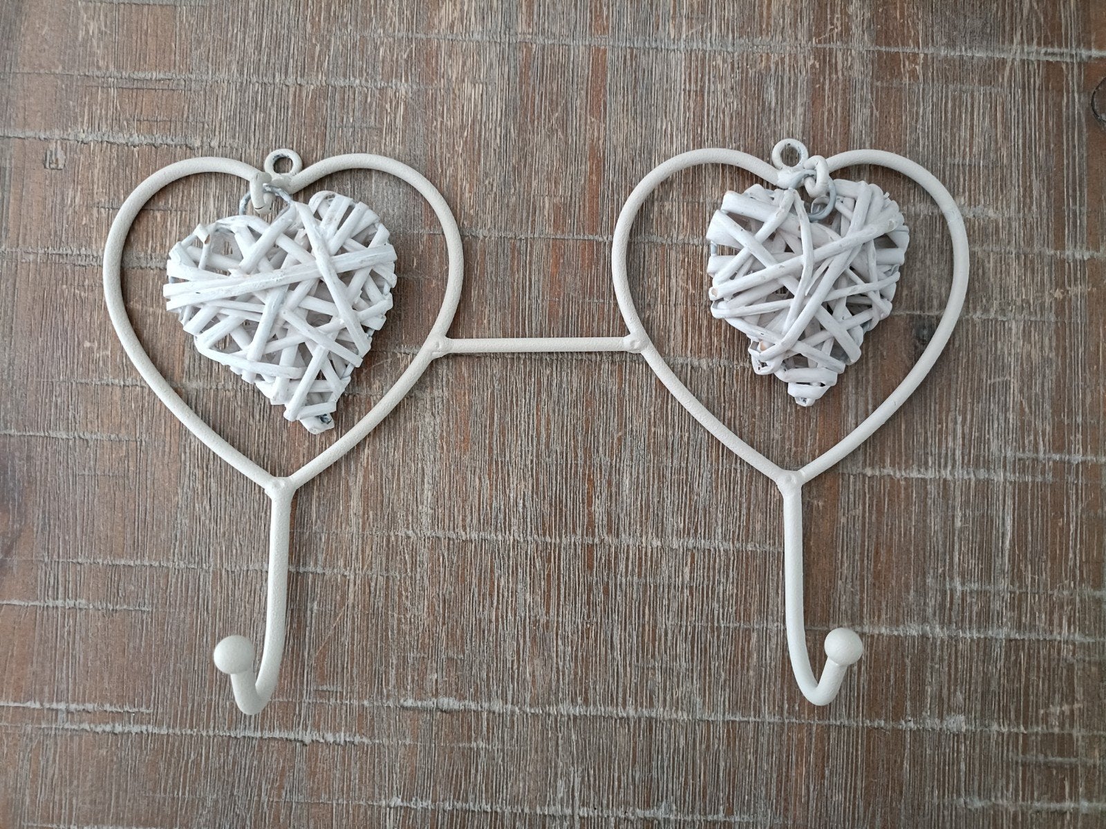 Witte stalen kapstokhaakjes met rieten hartjes, Huis en Inrichting, Woonaccessoires | Kapstokken, Ophalen of Verzenden, Wandkapstok