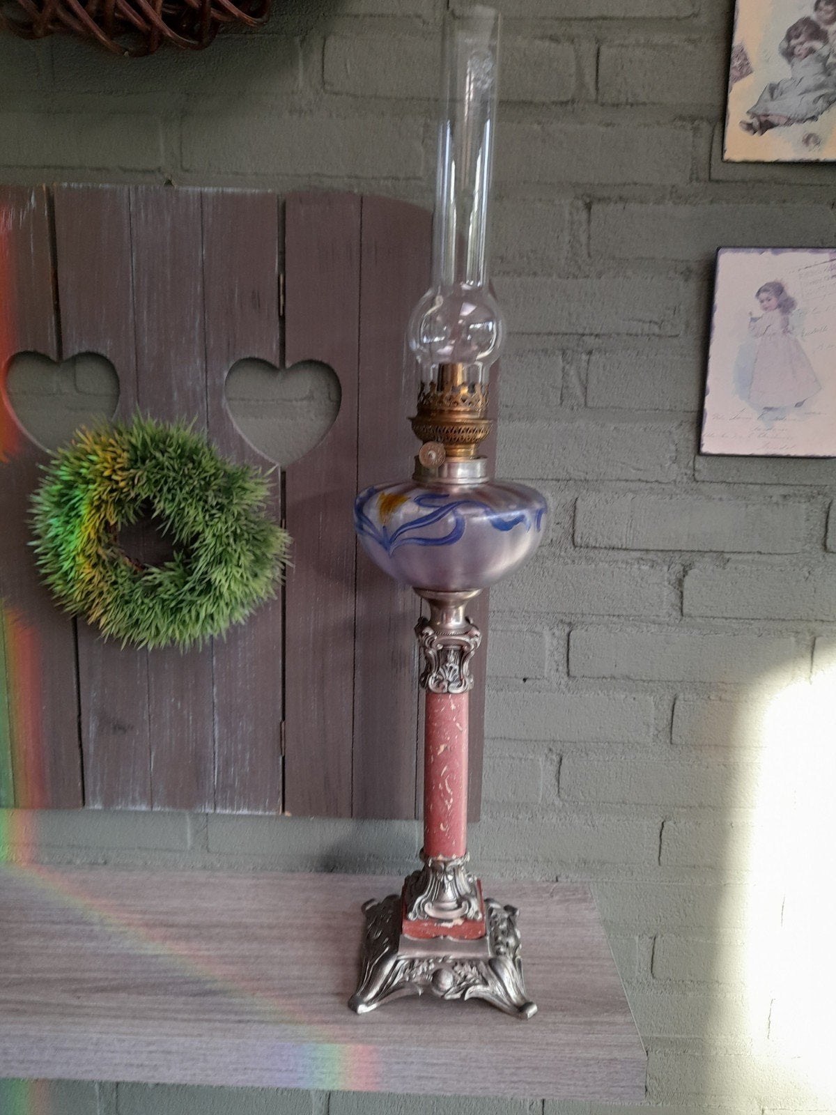 Antieke petroleumlamp., Ophalen