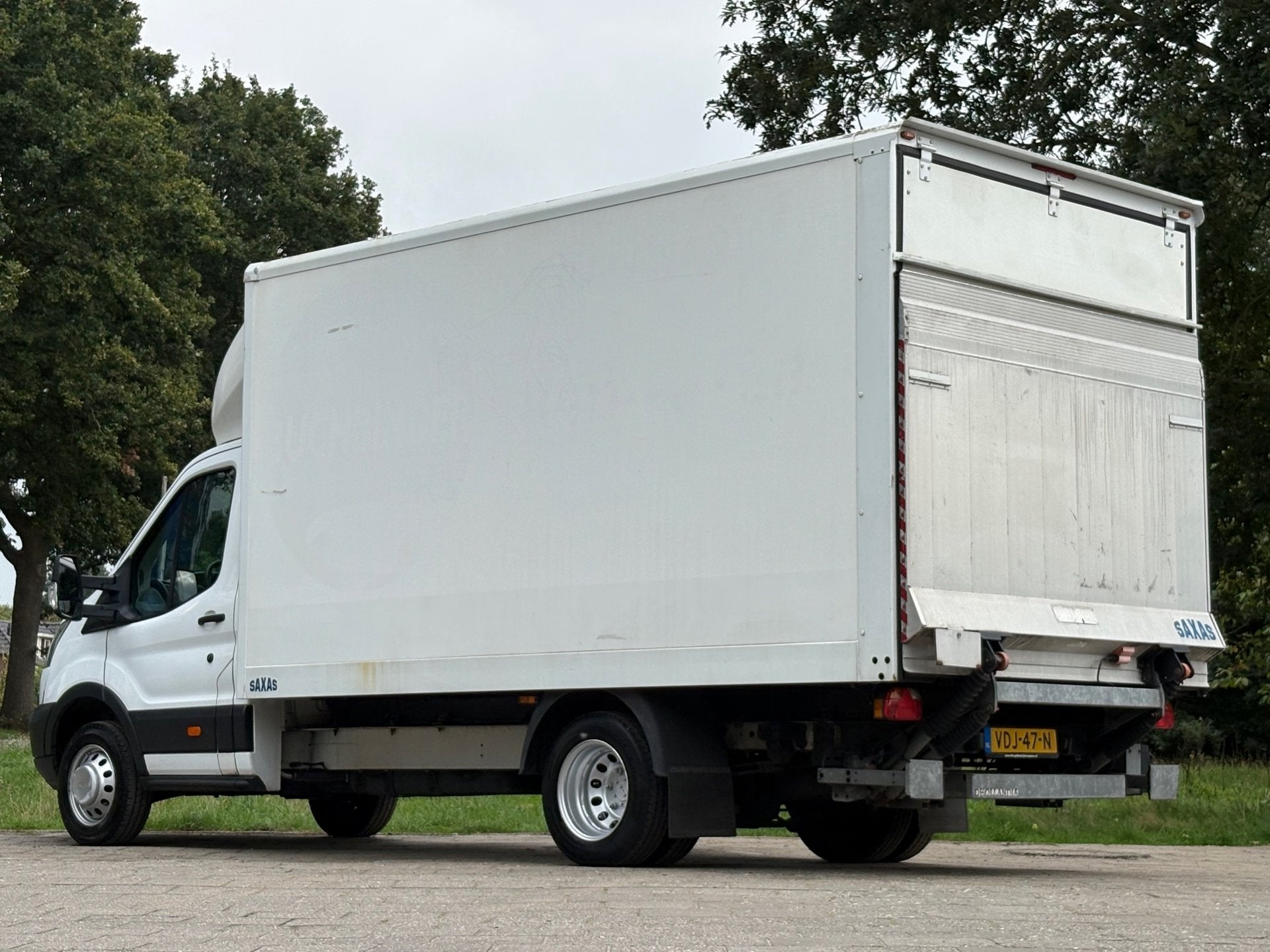 Ford Transit Bakwagen 350 2.0 TDCI L4H1|Dhollandia laadklep|, Auto's, Dealer onderhouden, 2800 kg, Wit, 14 km/l