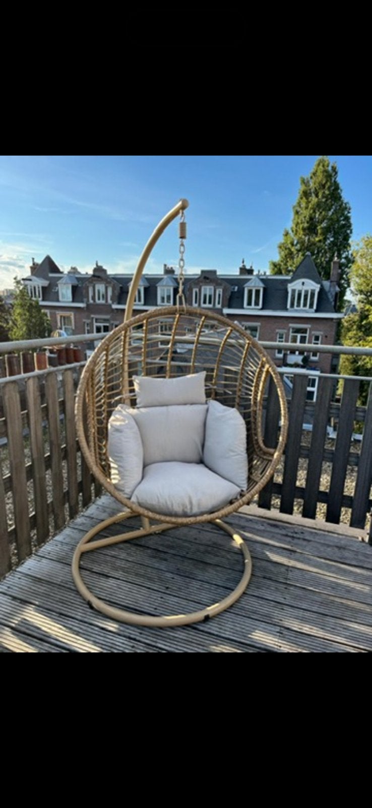 Outdoor hanging egg chair with cushions