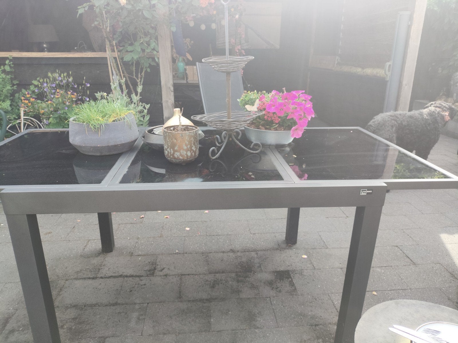 Tuintafel livarno,in/ uitschuifbaar, zwart glas met staal, Tuin en Terras, Tuintafels, Ophalen of Verzenden, Gebruikt, Rechthoekig