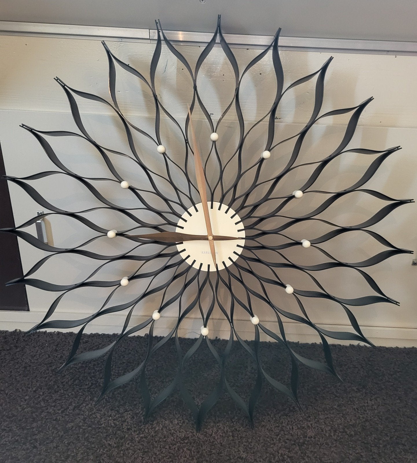Karlsson klok., Ophalen, Wandklok