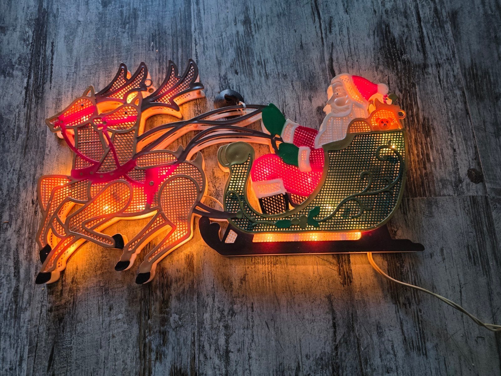 raamdecoratie kerstman in arreslee met licht, Ophalen