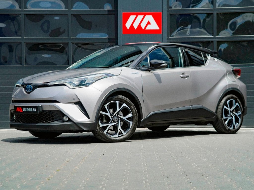 Toyota C-HR 1.8 Hybrid Bi-Tone | TREKHAAK | CAMERA |, Auto's, Toyota, 135 pk, Euro 6, 4 cilinders, Leder en Stof