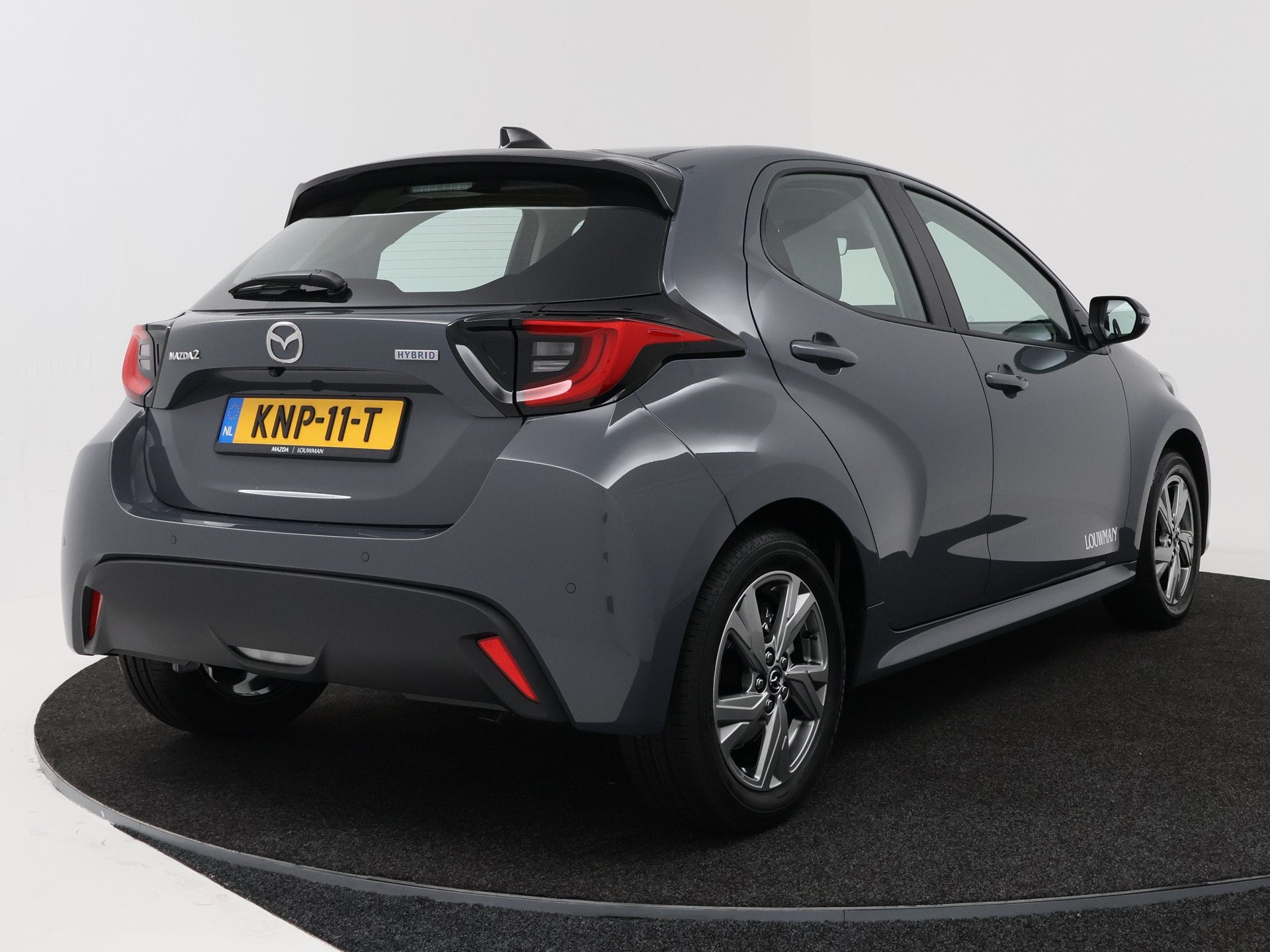 Mazda 2 Hybrid 1.5 Exclusive-line DEMO voordeel (bj 2026), Auto's, 12 maanden, Bedrijf, 26 km/l, Hybride Elektrisch/Benzine