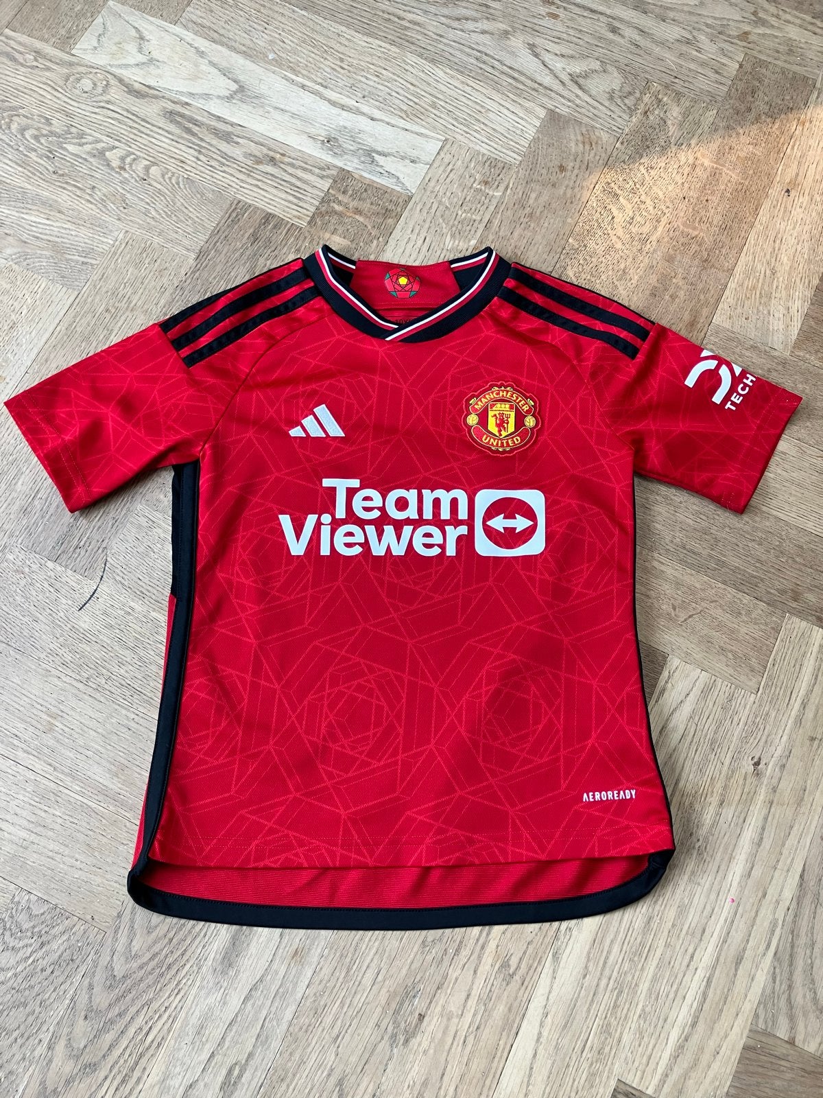 Manchester United Thuisshirt Rood - Maat 9-10 jaar / 140, Kinderen en Baby's, Kinderkleding | Maat 140, Ophalen of Verzenden, Zo goed als nieuw