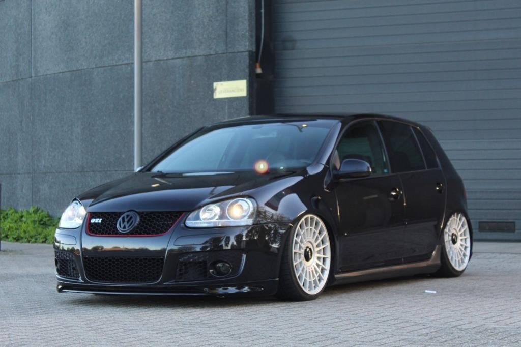Golf GTI | AirRide | 300PK | DSG | Rotiform | Leer | Nwe APK, Zwart, 4 cilinders, 1984 cc, Zwart