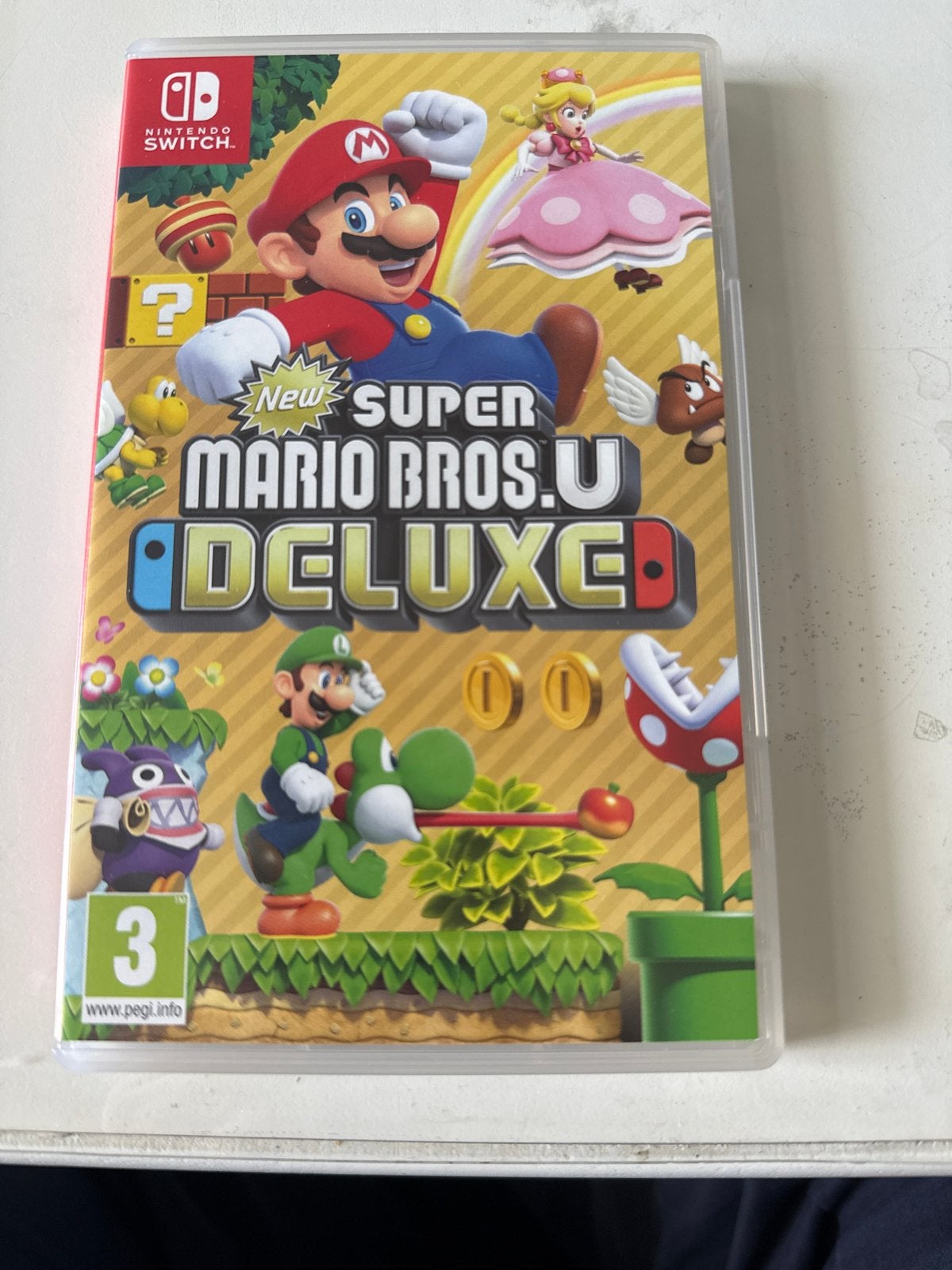 New Super Mario Bros. U Deluxe - Nintendo Switch, Spelcomputers en Games, Games | Nintendo Switch, Zo goed als nieuw, Platform