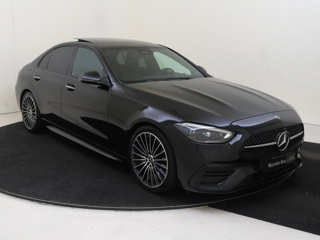 Mercedes-Benz C-klasse 180 AMG Line Panoramadak / Memory Sea, Auto's, Mercedes-Benz, Automaat, 4 cilinders, Leder en Stof, Zwart