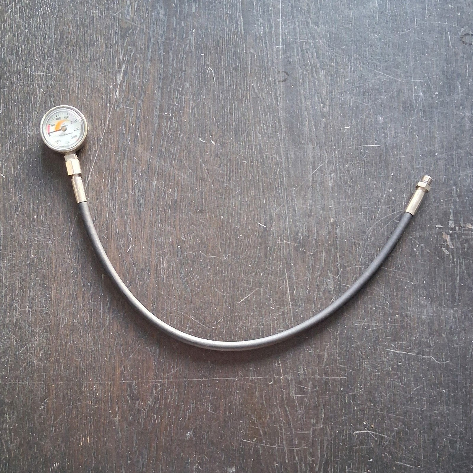 Te koop: Scubapro compact spg/manometer. Ca 57cm slang., Ophalen of Verzenden