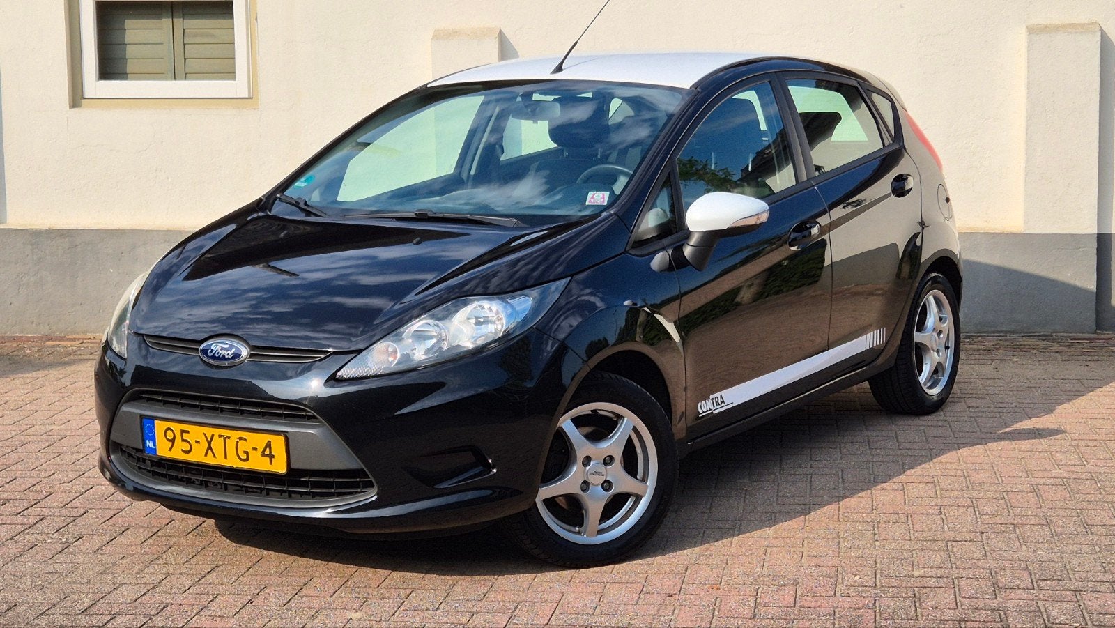 Ford Fiësta 1.25 44KW 5DR 2012 Zwart, Voorwielaandrijving, Stof, 40 €/maand, 1242 cc
