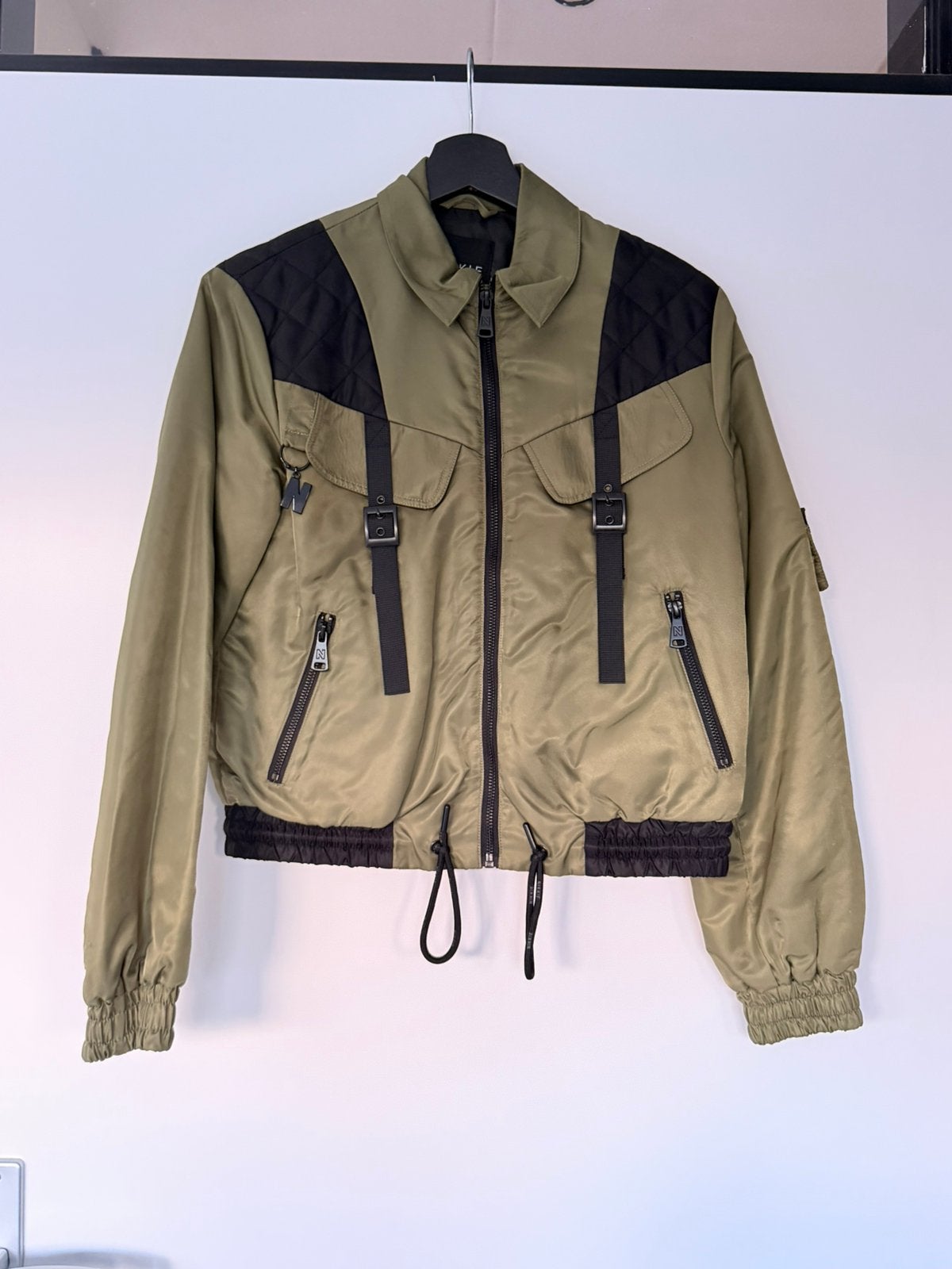 Nikkie jas 32, Ophalen of Verzenden, Zo goed als nieuw, Maat 34 (XS) of kleiner, Zwart