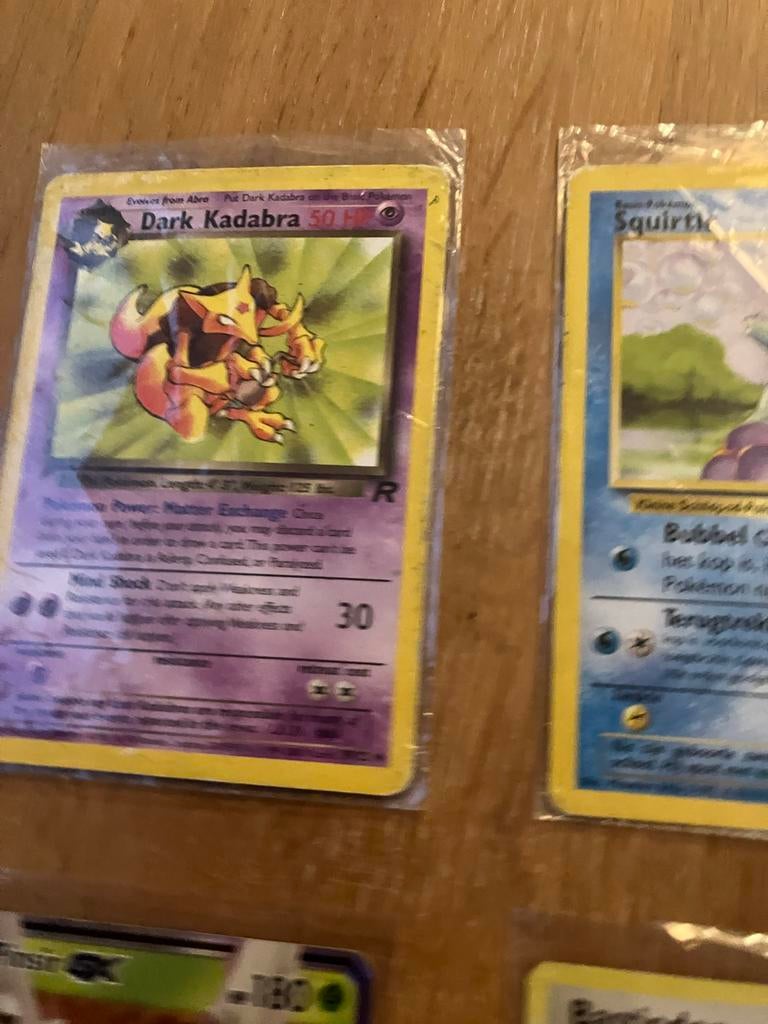 Waardevolle Pokémon Kaarten in beschermhoesjes, Ophalen, Zo goed als nieuw, Meerdere kaarten, Foil