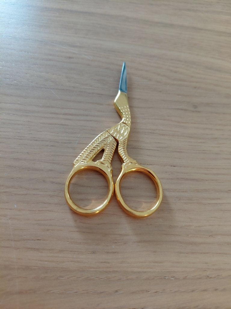 schaartje ooievaar goudkleurig, Ophalen of Verzenden, Zo goed als nieuw