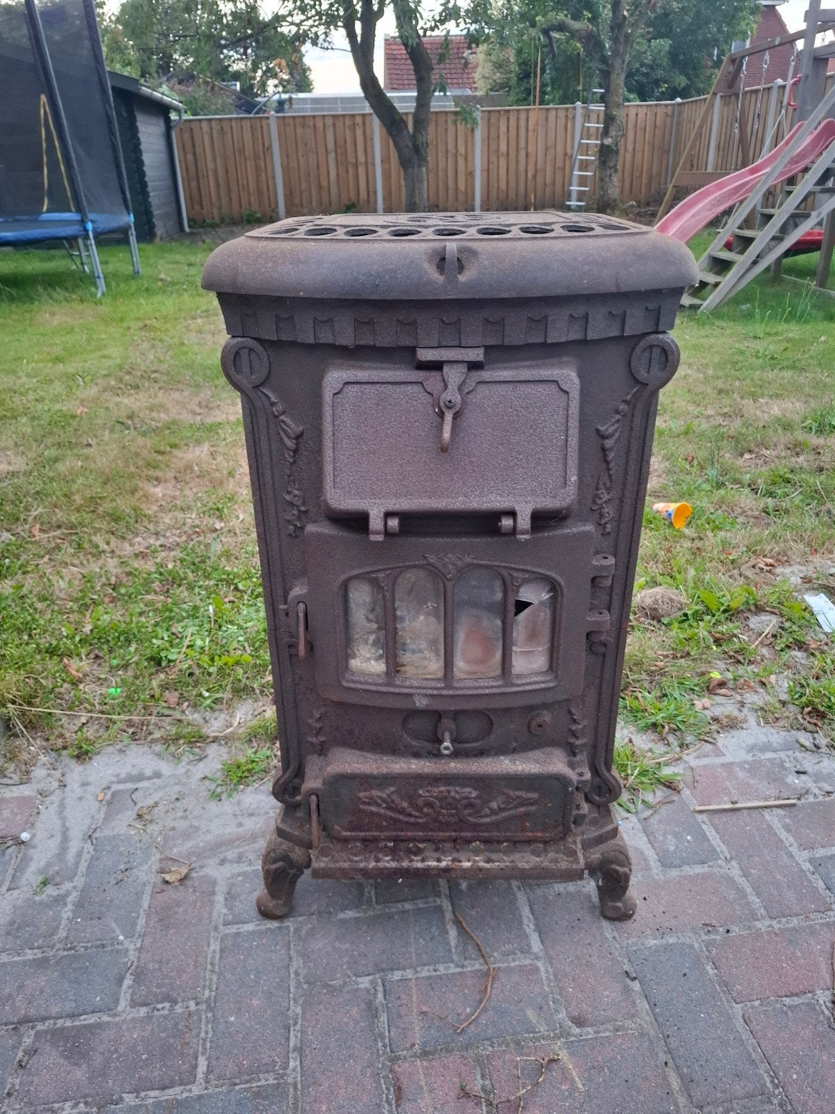 Ouderwetse houtkachel met kookfunctie met afvoerpijp, Huis en Inrichting, Kachels, Ophalen of Verzenden