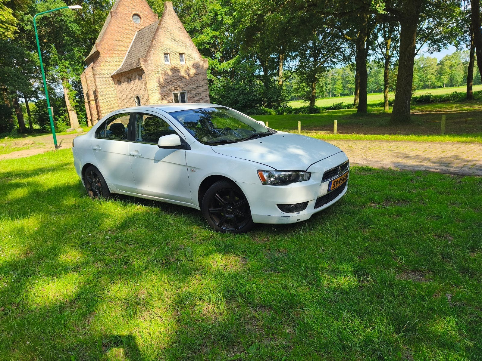 Mitsubishi Lancer 1.6 Cleartec Sports Sedan 2011 Wit, Auto's, Mitsubishi, Particulier, Lancer, Airbags, Airconditioning, Benzine