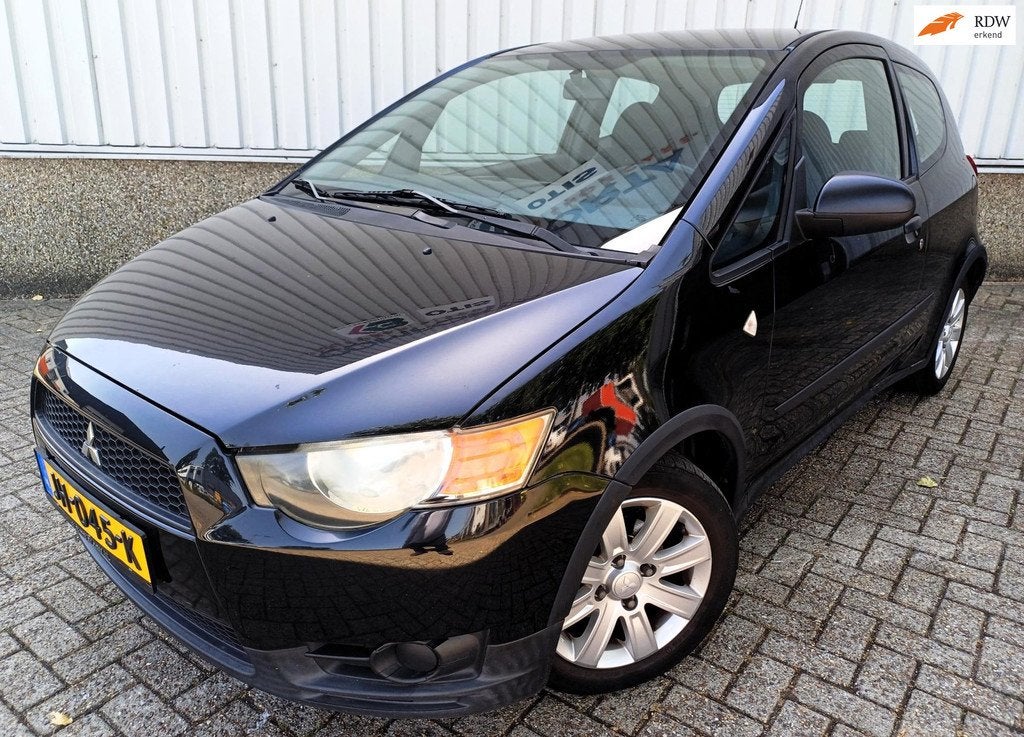 Mitsubishi Colt 1.1 Inbusiness * APK tot 02-04-2027, Auto's, Mitsubishi, Voorwielaandrijving, Euro 5, Stof, Gebruikt