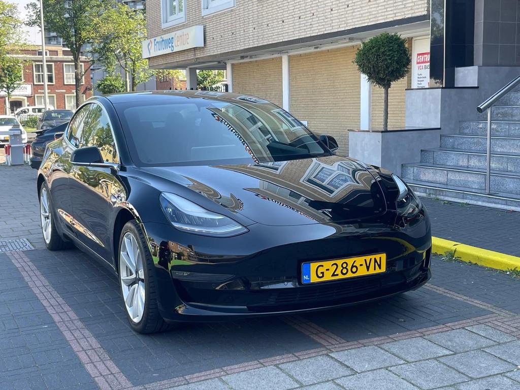Tesla Model 3 Long Range 75 kWh, Auto's, Tesla, Automaat, Leder en Stof, Zwart, Origineel Nederlands