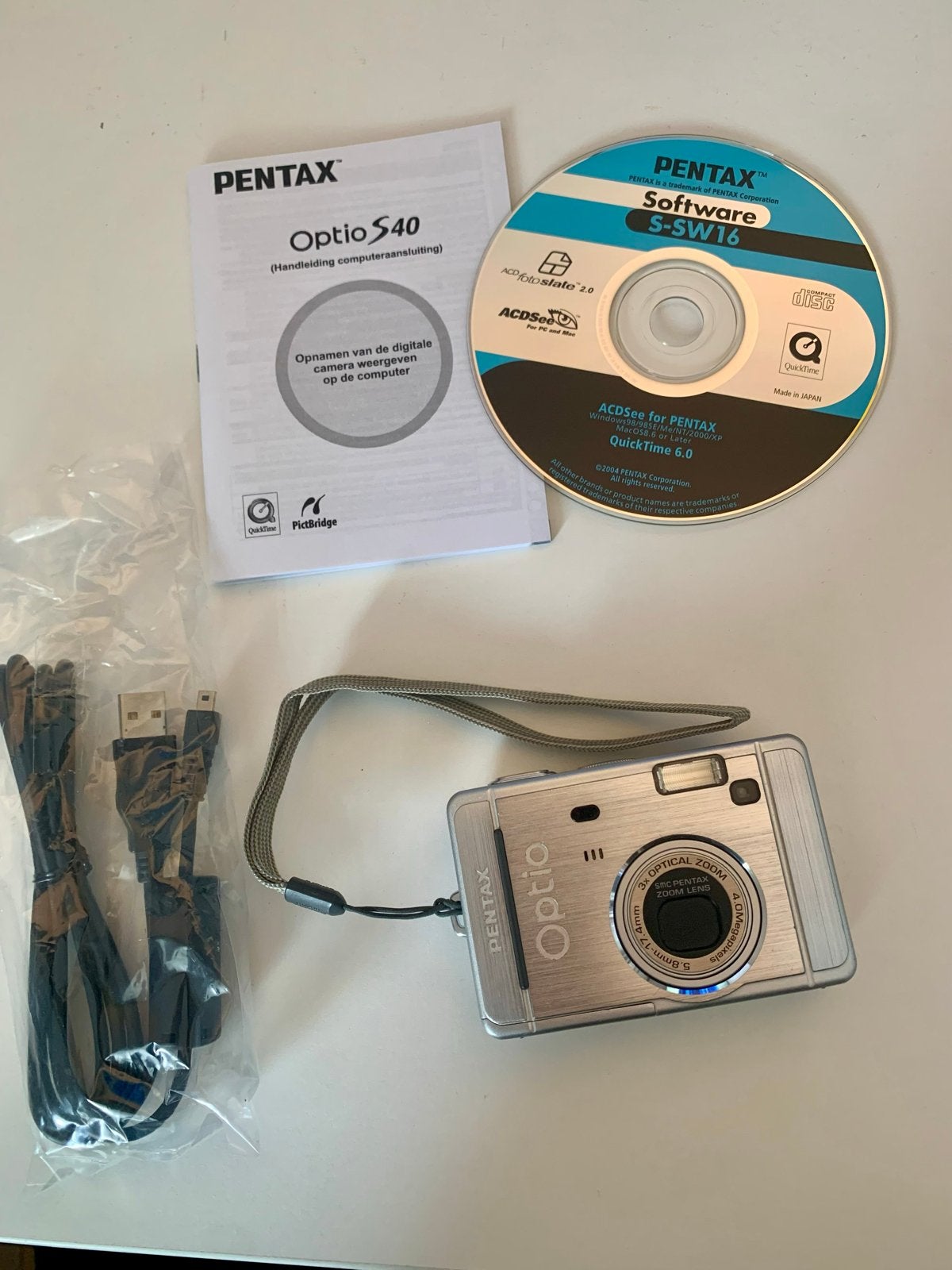 Pentax Optio S40 Digitale Camera - Compact en Compleet, Audio, Tv en Foto, Fotocamera's Digitaal, Zo goed als nieuw, Compactcamera
