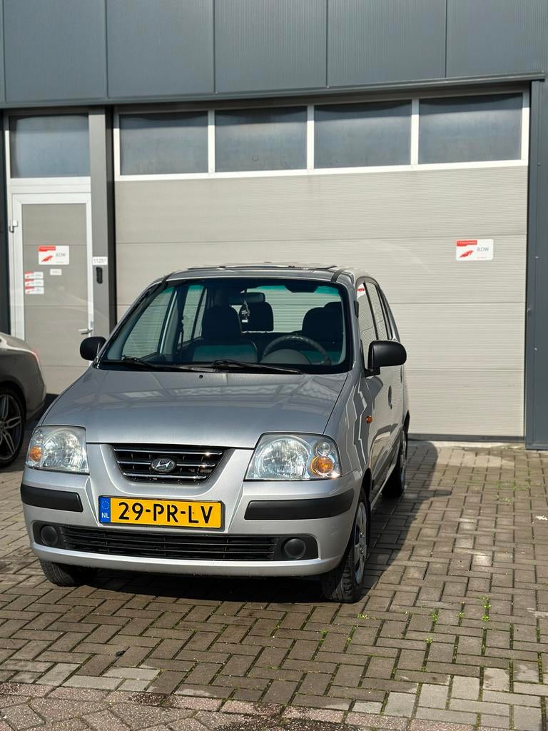 Hyundai Atos 1.1 2004, Auto's, Voorwielaandrijving, Stof, 31 €/maand, 4 cilinders