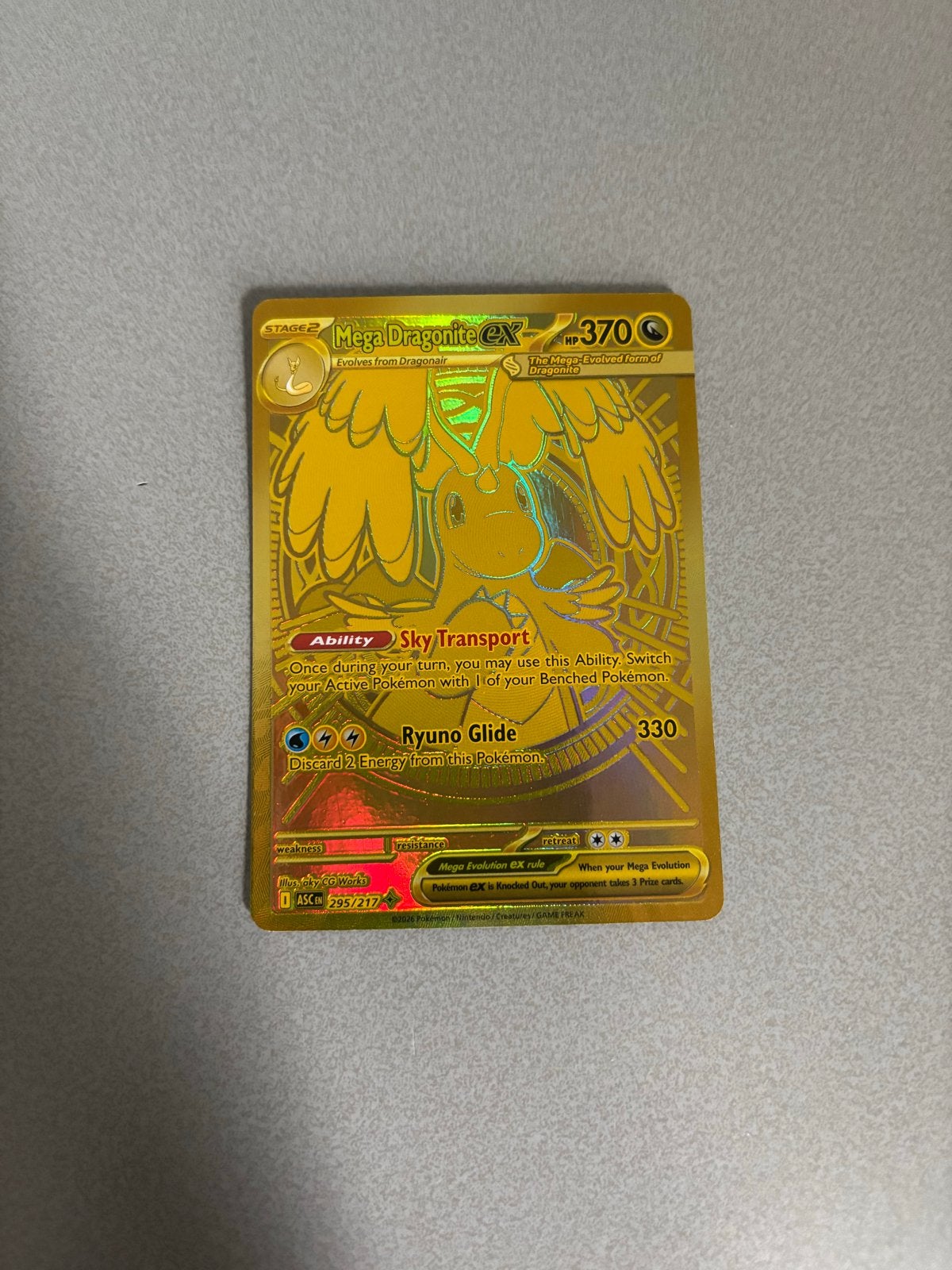 Gouden Mega Dragonite EX, Ophalen of Verzenden, Zo goed als nieuw, Losse kaart, Foil