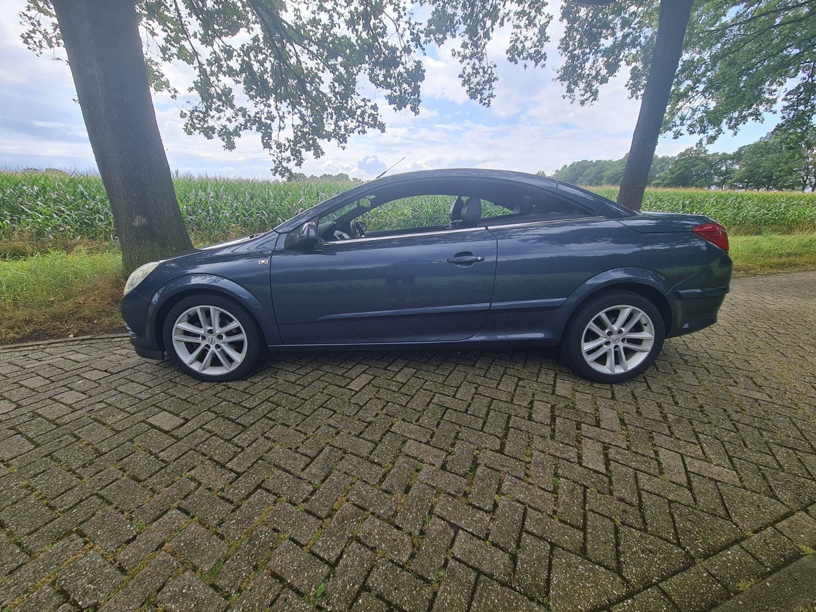 Opel Astra 1.8-16V 140pk 2007 Grijs, Zwart, 4 cilinders, Cabriolet, 4 stoelen