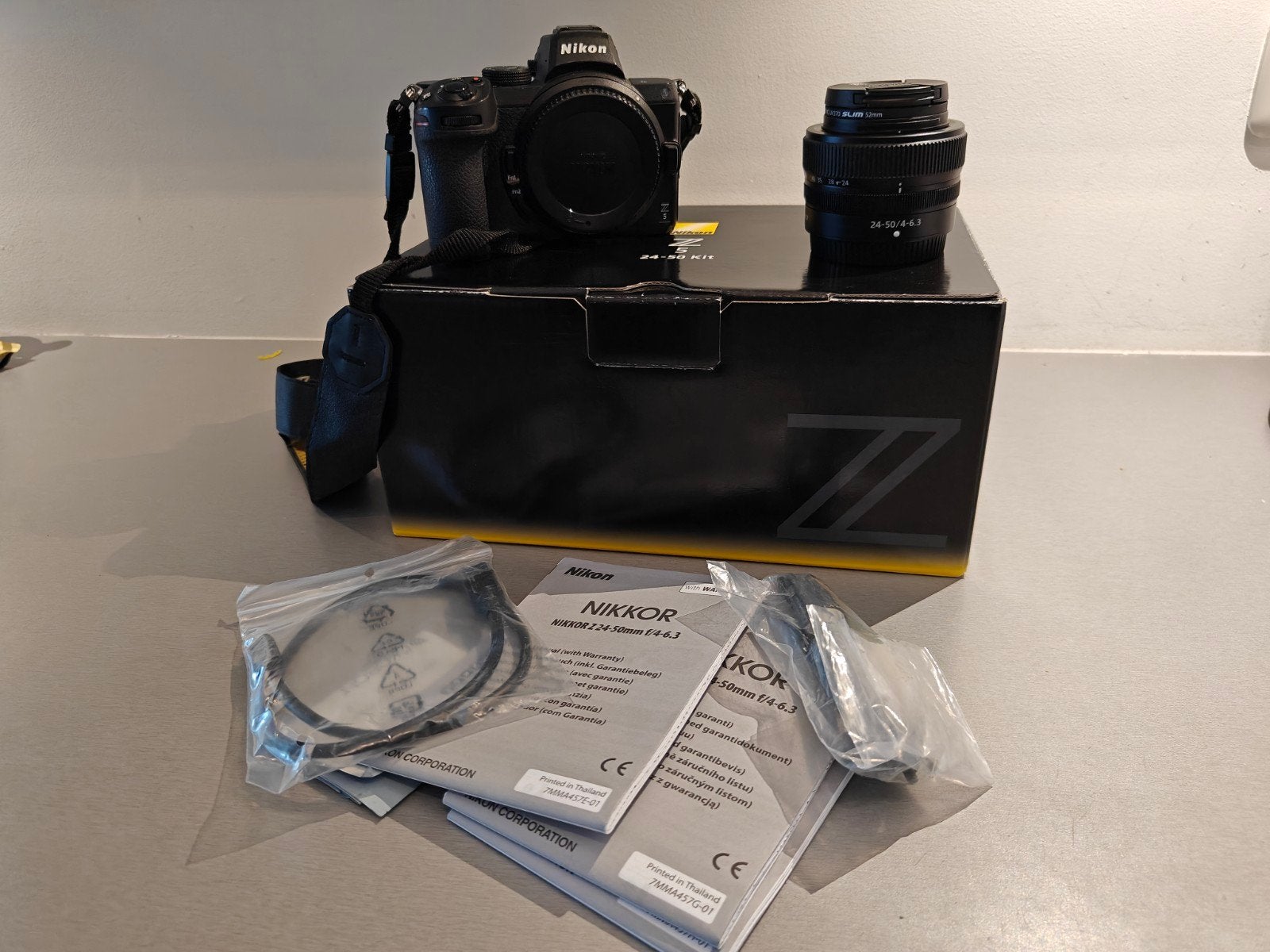 Nikon Z5 + Nikkor Z 24-50mm f/4-6.3 Kitlens + UV filter, Audio, Tv en Foto, Fotocamera's Digitaal, Nikon, Ophalen
