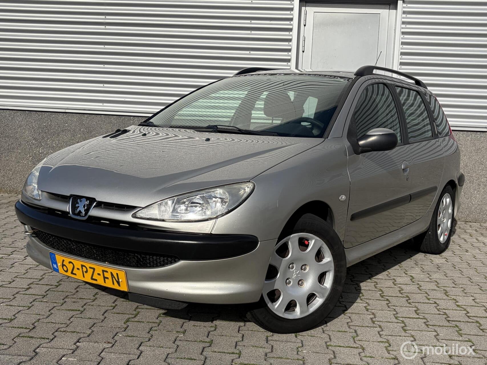 Peugeot 206 SW 1.4 Air-line Airco-nieuwe apk, Auto's, Voorwielaandrijving, Stof, Zwart, 4 cilinders